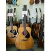 used/old acoustic guitar